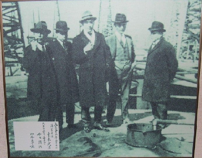 Isoroku Yamamoto with a group of men visiting the Orangefield oil field in 1924