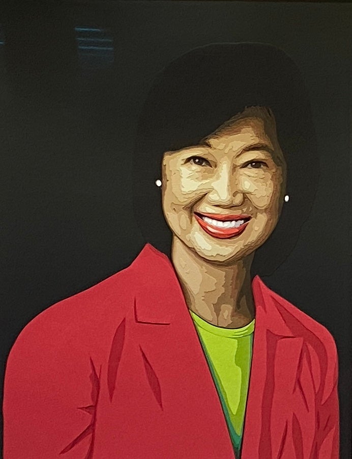 A portrait of Anne Chao constructed with hand-cut, layered paper