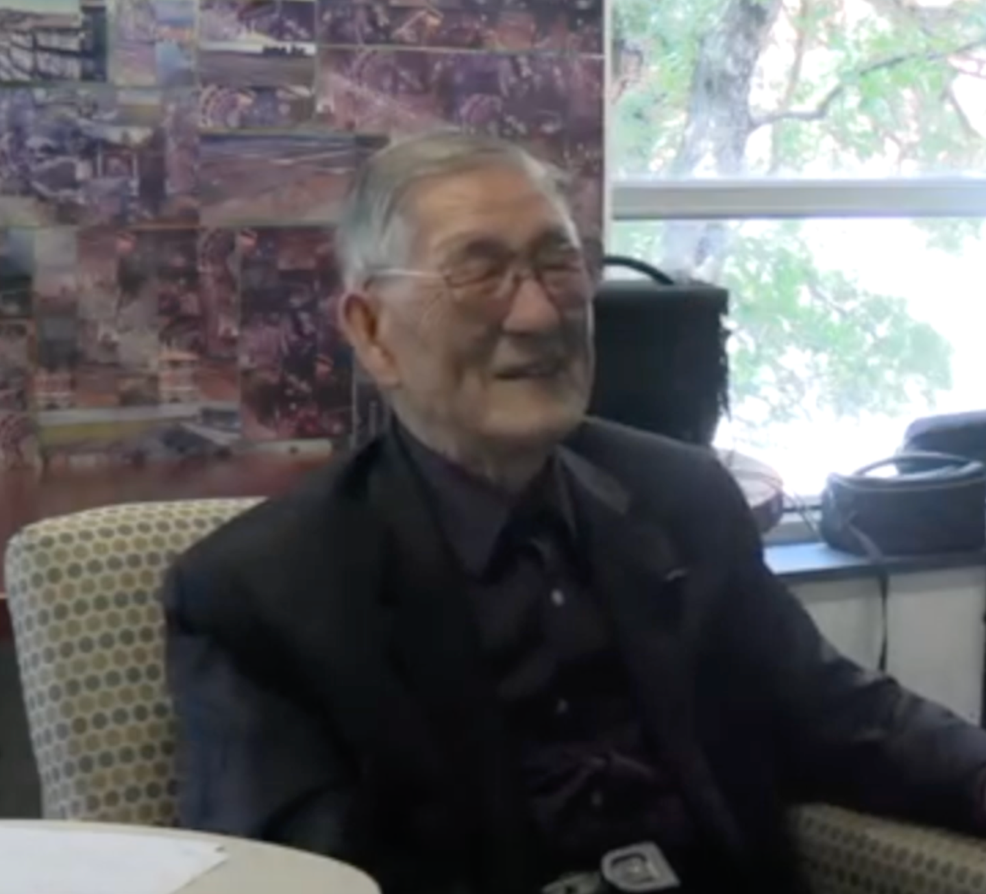 Nam Park sitting in a chair