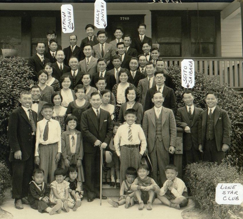 Historical group photo of the Lone Star Club, including members of the Kobayashi family